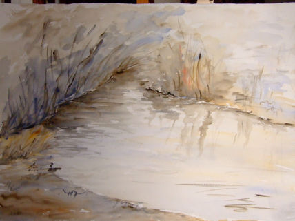 Arroyo entre cañas