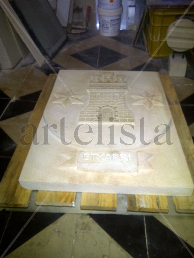 Escudo en piedra arenisca de Burgo