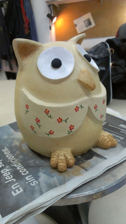Buho con flores