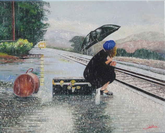 Joven esperando el tren