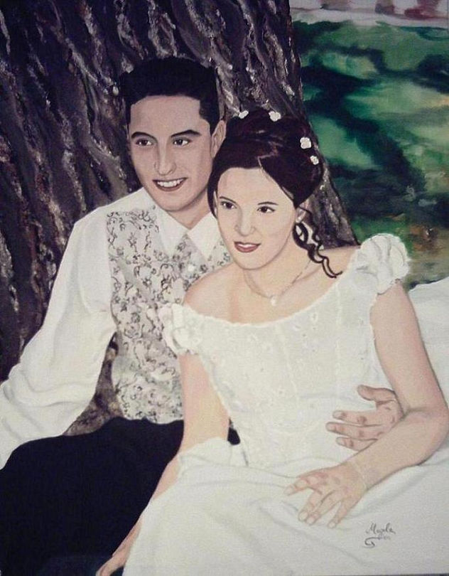 pareja junto al arbol