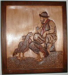 gaucho con gallos de riña