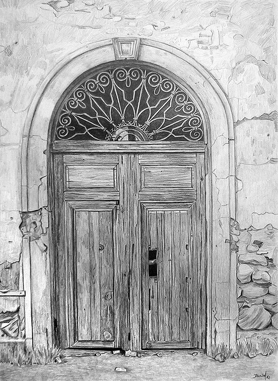 Puerta de la iglesia del cortijo El Fraile