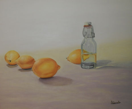 Botella y limones