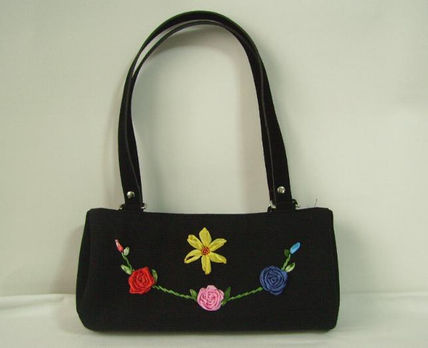 Cartera bordada en...