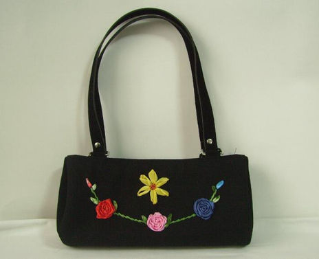 Cartera bordada en...