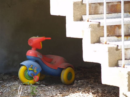 Triciclo en la sombra