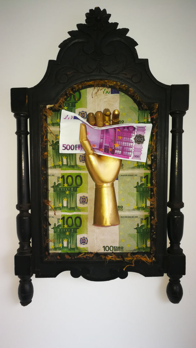 La ley de la atracción escultura poder del dinero