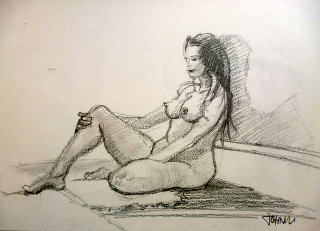 Mujer desnuda pensativa