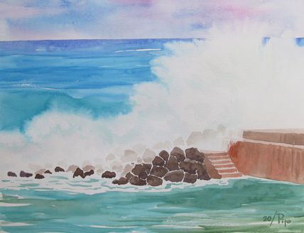 Olas en el espigón