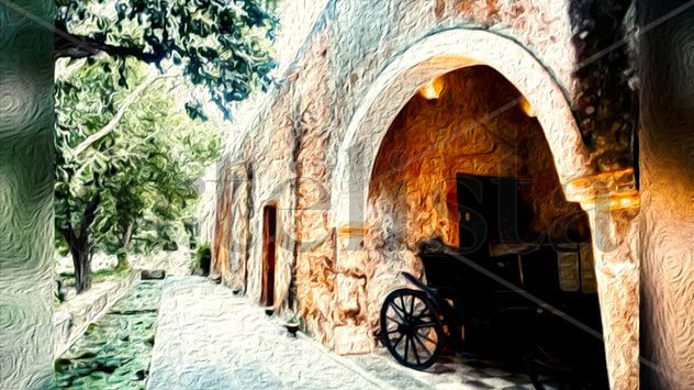 casa antigua con carruaje