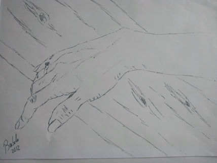 Mano sobre madera