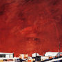 Tejados bajo cielo rojo espacial
