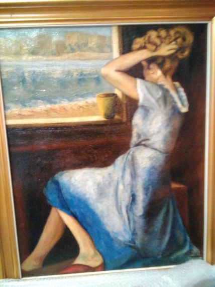 Dama de azul y ventana