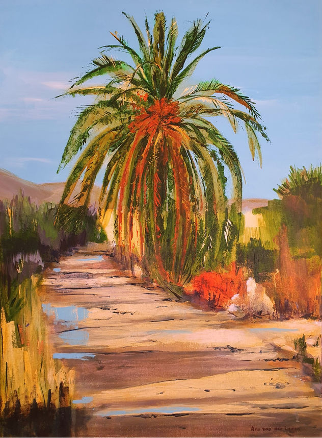 Palm tree and country road
