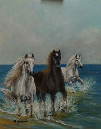 Caballos en la playa