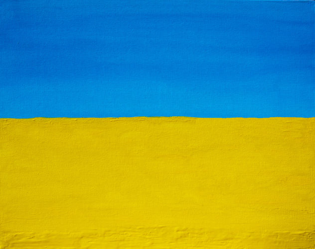 Yellow field and blue sky abstract