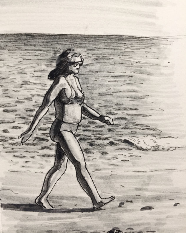 caminante en la playa