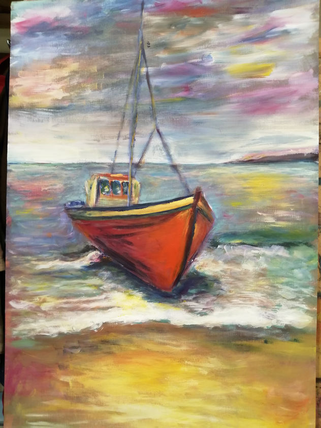 Barco de pezca en la orilla de la playa
