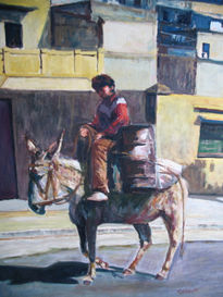 Niño en burro