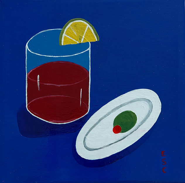 Drink and olive in plate