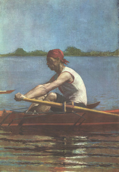 John Biglen at the oars of his skiff 