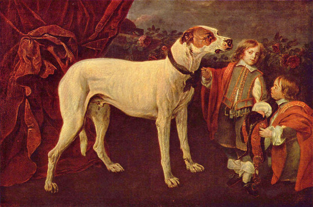 Perro grande, enano y niño