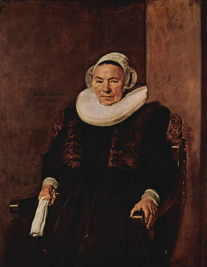 Portrait of a seated woman, about sixty years old, with a book in her right hand. 