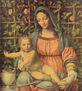 Madonna in front of the rose hedge