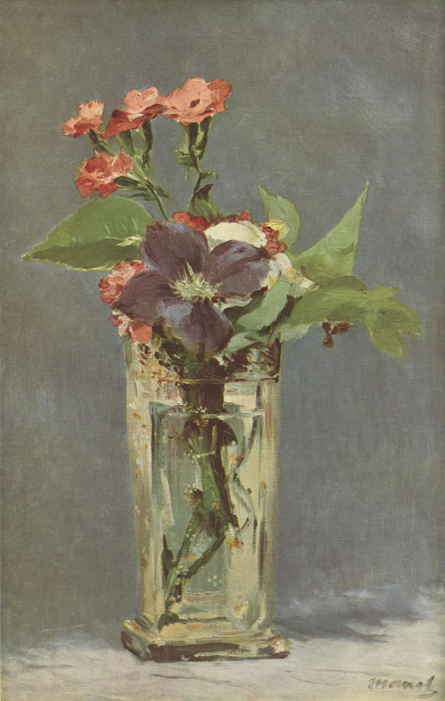 Clematis in a glass vase