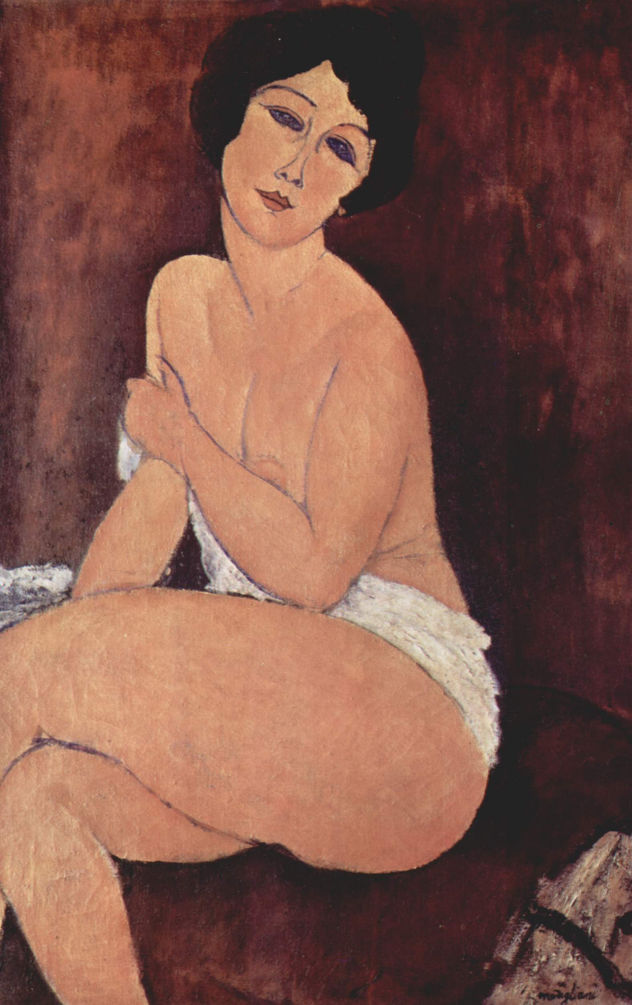Desnudo sentado en un sofá