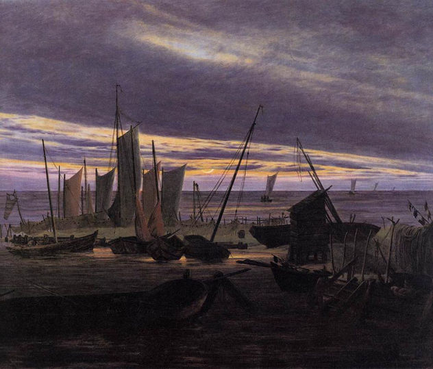 Barcos en el puerto al atardecer