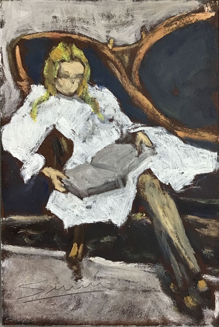 Muchacha leyendo.
