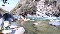 Niños en el río