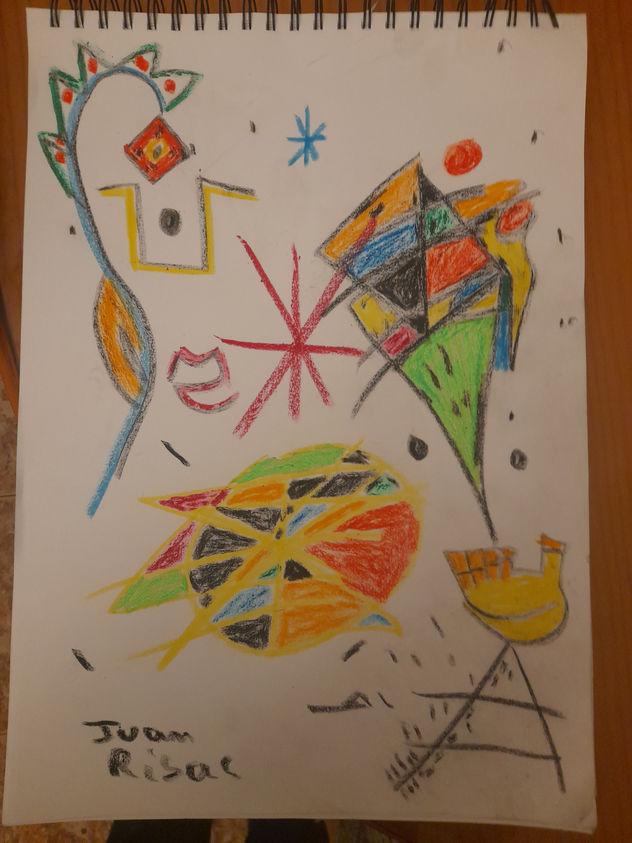 Mano con cometa de colores