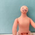 Young Doll Giving Birth to a Monk by a Cesarean Section — front