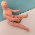 Young Doll Giving Birth to a Monk by a Cesarean Section — front