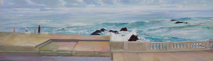 Pareja junto al mar