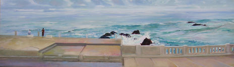 Pareja junto al mar