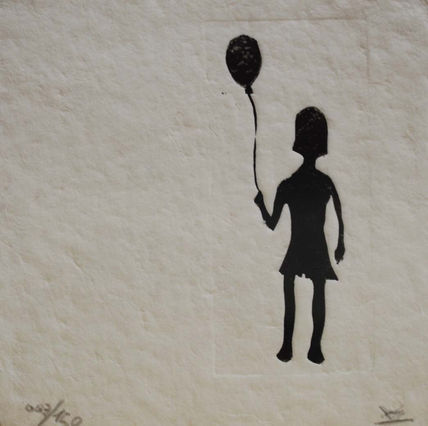 Niña con globo.