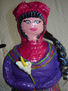 Muñeca con trenza, detalle