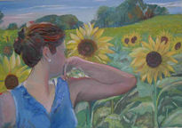 Mujer y girasoles