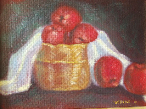 Cesto y manzanas
