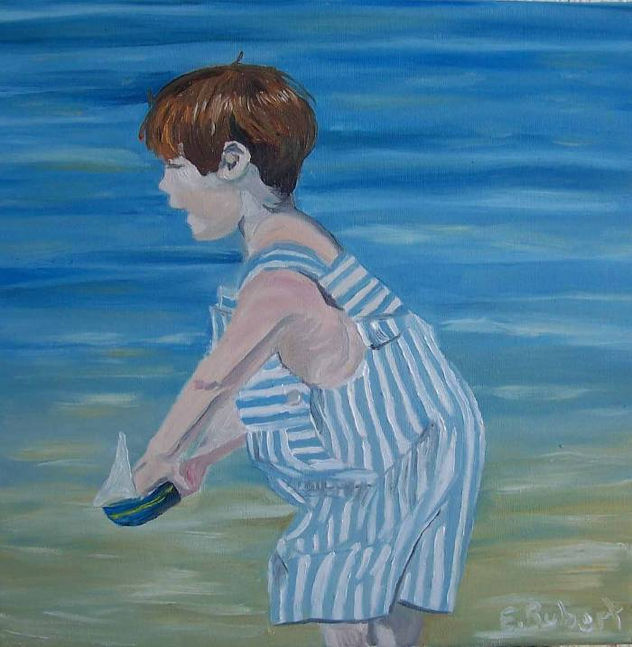 Niño con barca