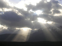 Sol entre nubes