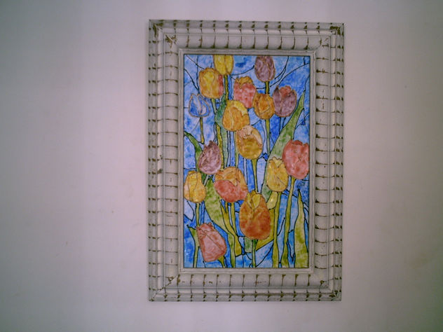 tulipanes en el cristal