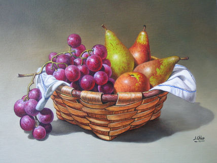 Cesto con uvas y peras