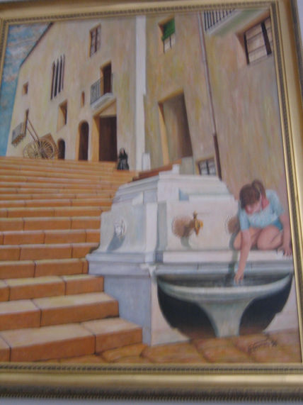 Niña en la fuente