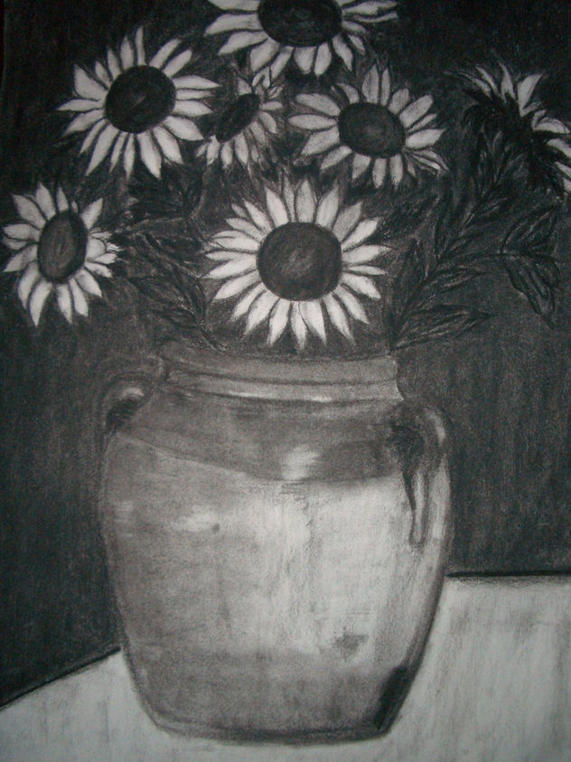 vasija con girasoles