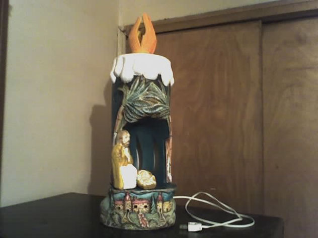 VELA CON PESEBRE